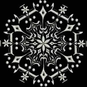 An embroidery design of a symmetrical floral motif featuring intricate patterns and delicate shapes.