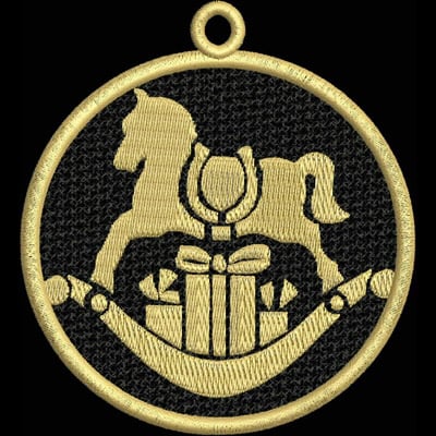 An embroidery design of a rocking horse silhouette above a wrapped gift, enclosed in a circular frame.