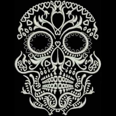 An embroidery design of an ornate skull featuring intricate swirls and heart shapes.