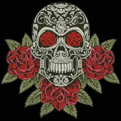An embroidery design of a decorated skull surrounded by vibrant red roses and green leaves.