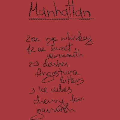 An embroidery design of a recipe for a Manhattan cocktail, featuring handwritten ingredients and instructions.