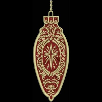 An embroidery design of an ornate pendant featuring intricate gold scrollwork and a central starburst motif against a rich red background.
