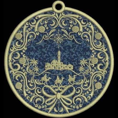 An embroidery design of a circular motif featuring a village scene with a star and palm trees, surrounded by intricate floral patterns and a bow at the bottom.