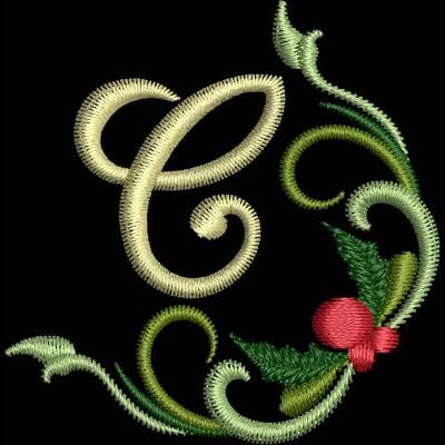 An embroidery design of an ornate letter "C" adorned with green leaves and a red berry.