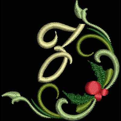 An embroidery design of an ornate letter "Z" embellished with green leaves and a red berry.