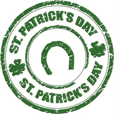 An embroidery design of a circular stamp featuring the text "ST. PATRICK'S DAY" and a horseshoe, accented by clovers.