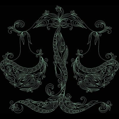 An embroidery design of a beautifully ornate set of scales, featuring intricate floral and swirling patterns.