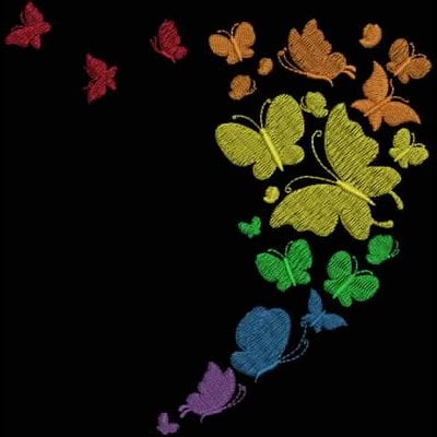 An embroidery design of colorful butterflies in various sizes, arranged in a swirling pattern that creates a vibrant movement.