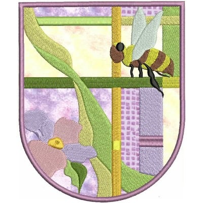An embroidery design of a bee beside stylized flowers and green vines, rendered within a shield-shaped frame.