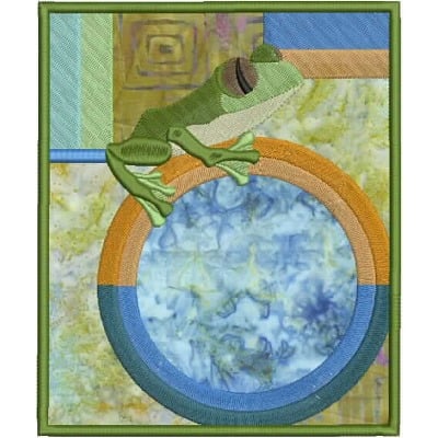 An embroidery design of a green frog perched on a circular frame with vibrant, layered colors.