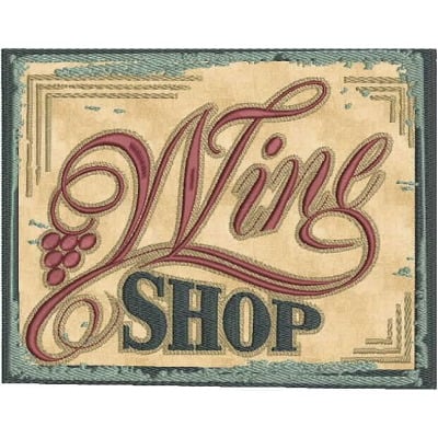 An embroidery design of the words "Wine Shop" in elegant script with decorative grapevine elements.