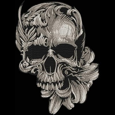 An embroidery design of an intricately detailed skull intertwined with ornate floral elements.