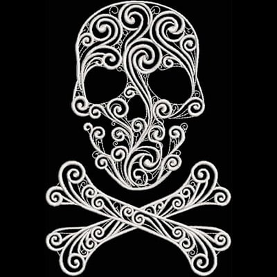 An embroidery design of a decorative skull adorned with swirling patterns and crossed bones beneath it.