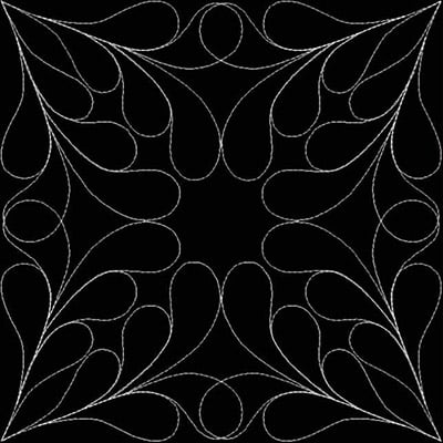 An embroidery design of intricate, symmetrical leafy shapes radiating from the center, creating a visually striking pattern.