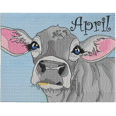An embroidery design of a cute gray cow with expressive eyes and a playful expression, alongside the name "April" in an elegant font.