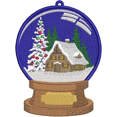 An embroidery design of a snow globe featuring a cozy cottage surrounded by snow-covered trees and a decorated evergreen.