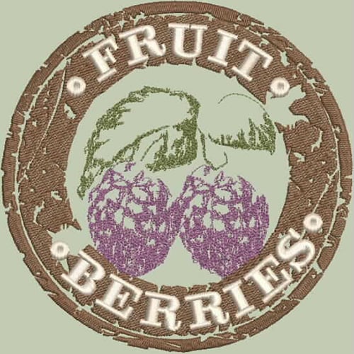 An embroidery design of two purple berries with green leaves inside a circular text border that reads "FRUIT BERRIES."