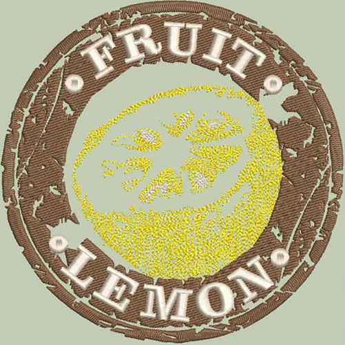 An embroidery design of a lemon slice featured in a circular badge with the words "FRUIT" and "LEMON" prominently displayed.