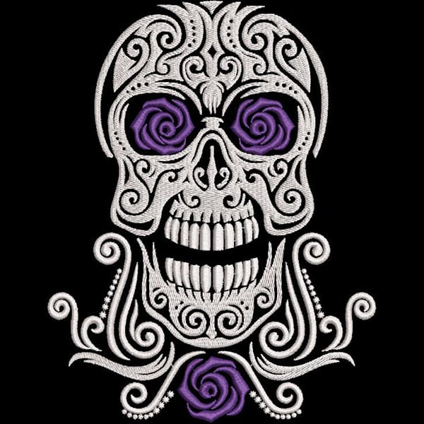 An embroidery design of a decorated skull featuring intricate patterns, with purple roses in the eye sockets and elegant swirls surrounding it.
