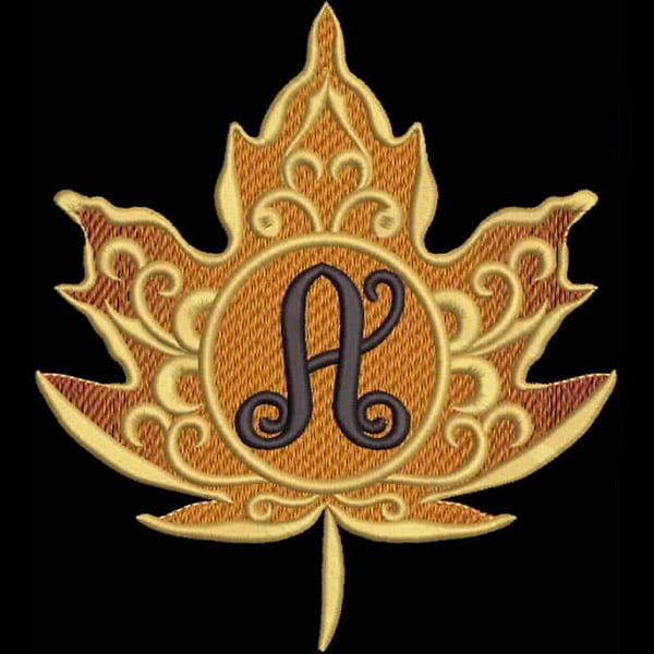 An embroidery design of a decorative maple leaf featuring intricate patterns with a stylized letter "A" in the center.