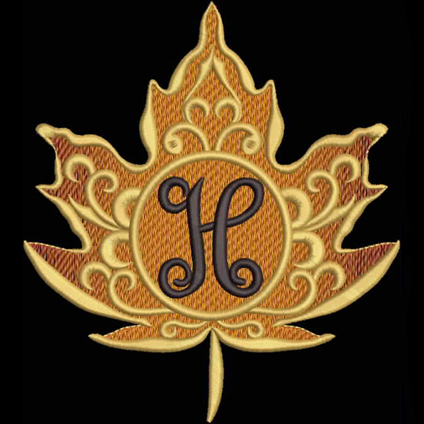 An embroidery design of a stylized maple leaf featuring intricate patterns and a central monogram "H" in a contrasting dark hue.