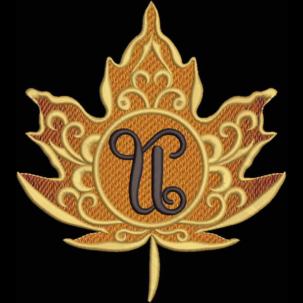 An embroidery design of a decorative maple leaf featuring intricate patterns and a stylized letter "C" in the center.