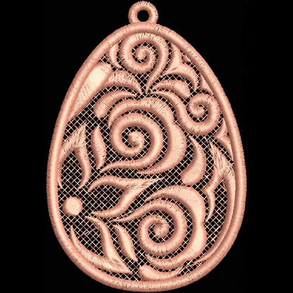 An embroidery design of an intricate, egg-shaped motif with swirls, floral patterns, and a delicate mesh-like background.